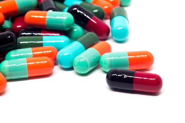 colorful gelatin pills capsules on white background