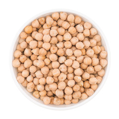 Chickpeas in a white bowl over white background