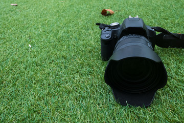 camera on a grass background