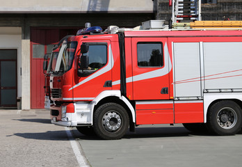 red fire engine truck during a fire drill