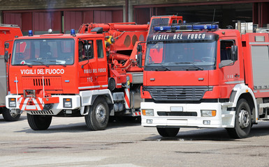many red truck fire engines firefighters