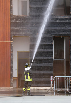 Firefighters extinguished the fire in the building during practi