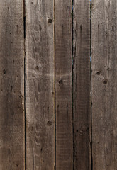 Naklejka premium dark gray wood background: fence made of planks