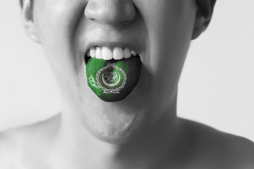Arab League flag painted in tongue of a man - indicating Arabic language