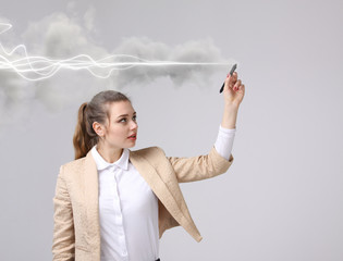Woman making magic effect - flash lightning. The concept of electricity, high energy.