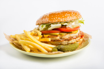 Hamburger with french fries and pickles