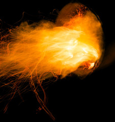 fire with sparks on a black background