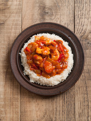 Chicken and vegetables in tomato sauce and rice