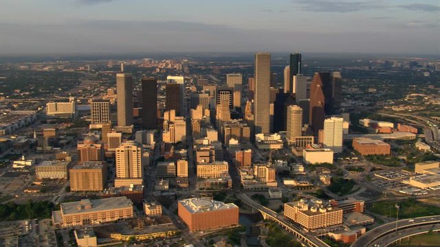 Orbiting downtown Houston in late afternoon light, freeway in foreground. Shot in 2007.