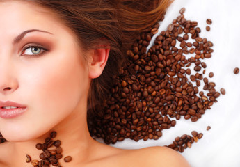 woman's face with coffee  beans
