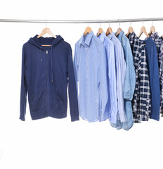 Choice of man clothes of different colors on hangers

