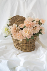 Basket with artificial flowers