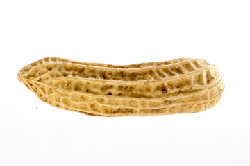 Peanuts in close up on a white background
