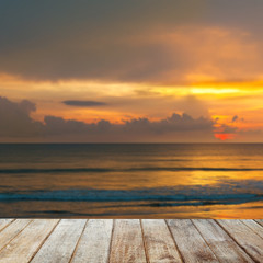 Fototapeta na wymiar Wood Terrace on The Beach with Sunset