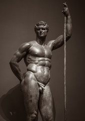 Fototapeta na wymiar Human perfect body Ancient male statue