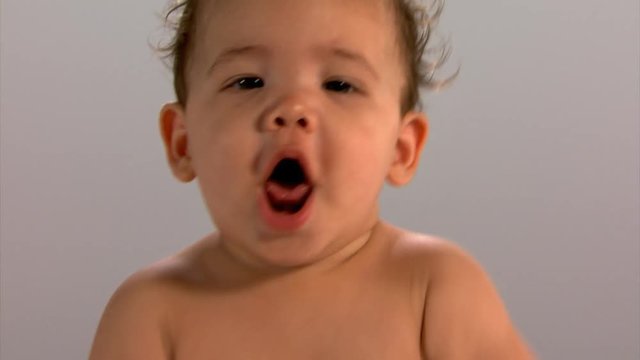 Close-up face of babbling baby