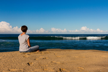 Fototapeta na wymiar Young Woman relax on a Beach