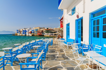 A view of restaurant in Little Venice part of Mykonos town, Mykonos island, Greece - obrazy, fototapety, plakaty