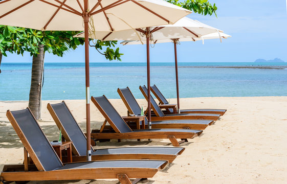 Beach chairs on the beach with blue sky,Koh Samui in Thailand