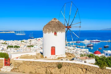 Papier Peint photo Île A view of famous traditional windmill overlooking Mykonos port, island of Mykonos, Cyclades, Greece