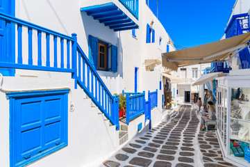 A view of whitewashed cycladic street in beautiful Mykonos town, Cyclades islands, Greece © pkazmierczak