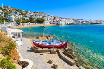A view of fishing boat on coastal promenade in Mykonos town, Cyclades islands, Greece