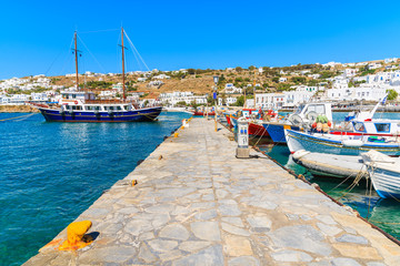 Boats mooring at pier in Mykonos port, Cyclades islands, Greece © pkazmierczak