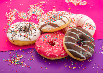 Donuts on color background.