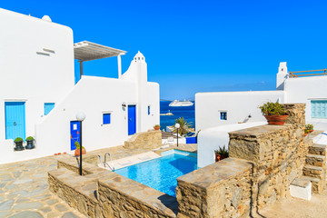 MYKONOS ISLAND, GREECE - MAY 17, 2016: luxury holiday apartments with swimming pool in beautiful Mykonos town, Cyclades islands, Greece. © pkazmierczak