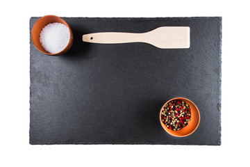 colored peppers and salt, top view, isolated