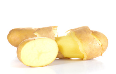Fresh potatoes full ball and cut half on white background.