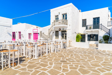 Square with taverna buildings in Naoussa port, Paros island, Greece