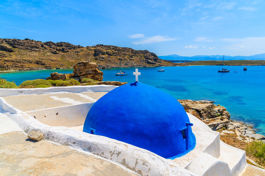 Blue dome of typical Greek church in Monastiri bay, Paros island, Greece
