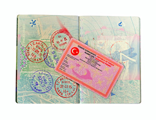 British passport and Turkish residence visa isolated on white