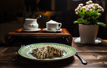 coffee americano with beans on wooden table
