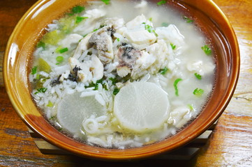 rice porridge with fish and radish hot soup on bowl