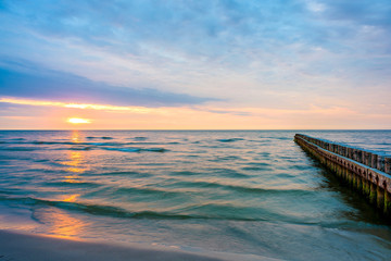Beautiful sunset on beach in Leba coastal town, Baltic Sea, Poland