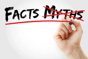 Hand writing Facts Myths with marker, concept background