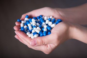 close up of tablets in female hands