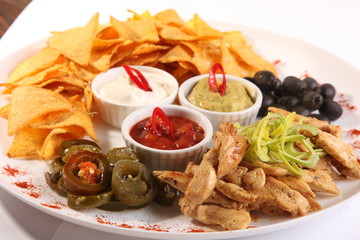 nachos with tomato and olives