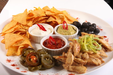 nachos with tomato and olives