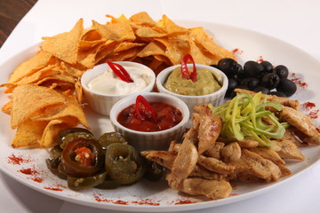 nachos with tomato and olives