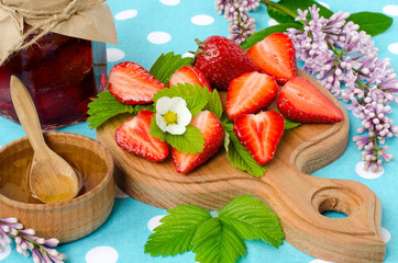 The summer season. Strawberries and strawberry jam.