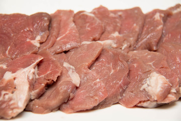  beef  breast meat on chopping board