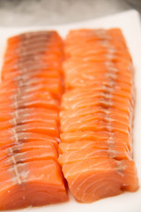  slice fillet Salmon fresh on dish  closeup