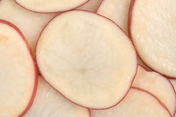 Sliced red potatoes top close view.