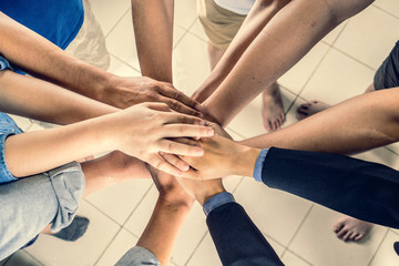 Business, business people showing unity with their hands together