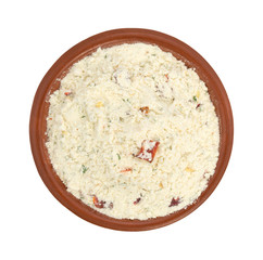 Guacamole seasoning mix in a small bowl top view isolated on a white background.
