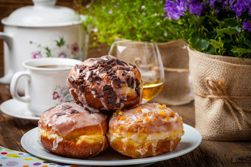 Sweet donut on a plate.