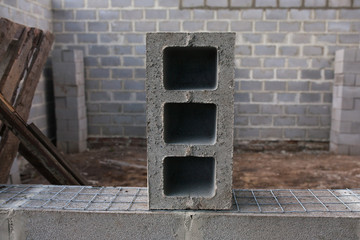 gray cinder blocks at a construction site background.